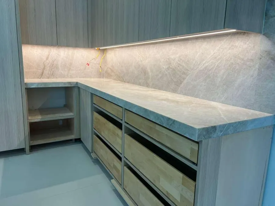 Quartzite counter and backsplash with LED lighting underneath